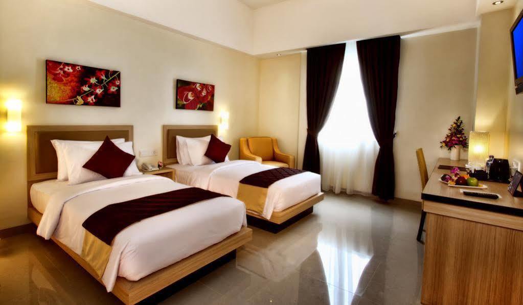 Orchardz Hotel Ayani Понтианак Экстерьер фото